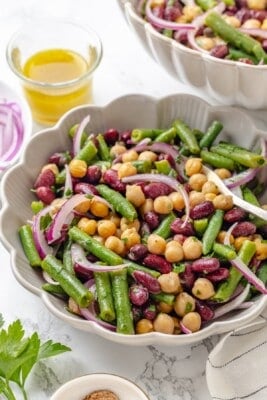 A serving bowl loaded with the best three bean salad.
