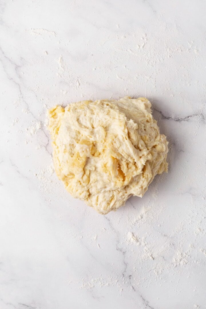 Perfectly soft and chewy, these homemade vegan flour tortillas puff up beautifully in the pan and are ideal for your next burrito. Flour tortilla dough on a floured work surface.