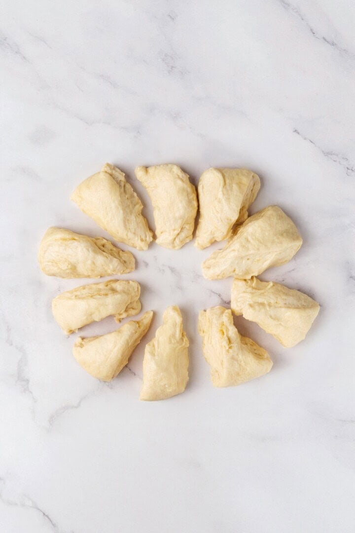 Perfectly soft and chewy, these homemade vegan flour tortillas puff up beautifully in the pan and are ideal for your next burrito. Vegan flour tortilla dough divided into ten equal pieces.